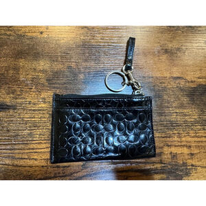 Coach Signature Embossed Patent Leather Mini Skinny